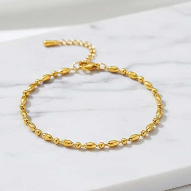 Pulseira bolinhas variadas dourada Em Aço Inoxidável